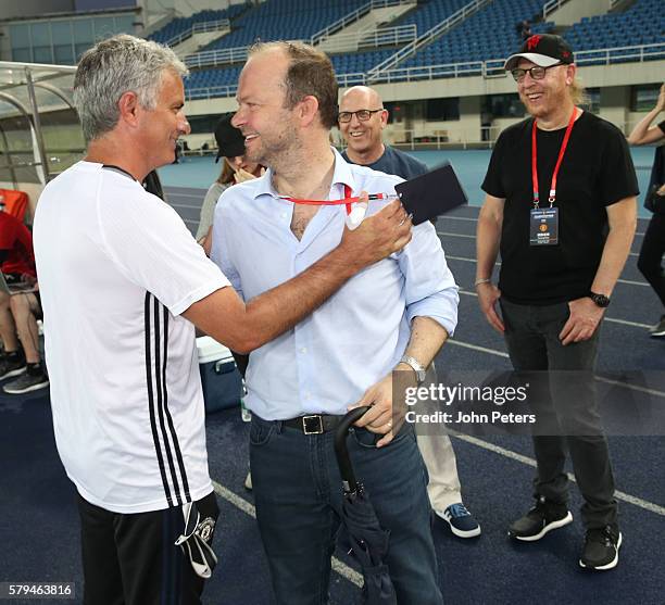 Manager Jose Mourinho of Manchester United greets Executive vice-chairman Ed Woodward after a press conference as part of their pre-season tour of...