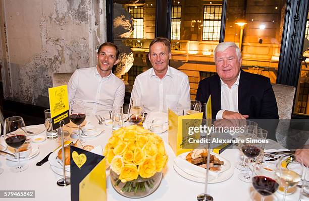 Head coach Thomas Tuchel and CEO Hans-Joachim Watzke of Borussia Dortmund together with Dr. Klaus Engel, CEO of Evonik Industries AG, during the Puma...