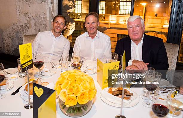 Head coach Thomas Tuchel and CEO Hans-Joachim Watzke of Borussia Dortmund together with Dr. Klaus Engel, CEO of Evonik Industries AG, during the Puma...