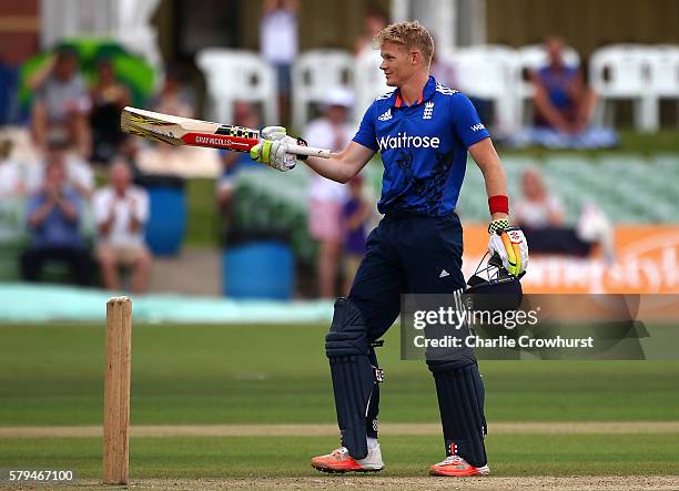 Sam Billings of England celebrates his century during the Triangular Series match between England Lions and Pakistan A at The Spitfire Ground on July...