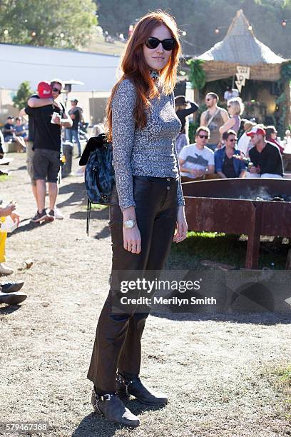 Artist Kitty Callaghan wears Jil Sander trousers, Prada sunglasses, RM Williams boots and a vintage top during Splendour in the Grass 2016 on July...