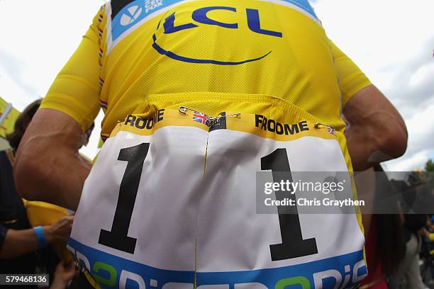 Chris Froome of Great Britain and Team Sky fashions the yellow Jersey prior to stage twenty one of the 2016 Le Tour de France, from Chantilly to...