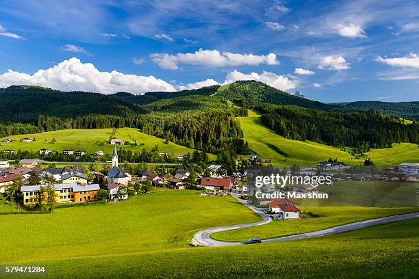 landscape of russbach am pass gschutt, austria. - mountain village stockfoto's en -beelden