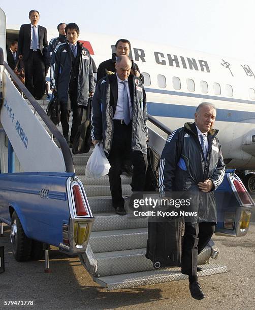 North Korea - Japan national soccer team coach Alberto Zaccheroni and other team officials and members arrive at Pyongyang's international airport on...