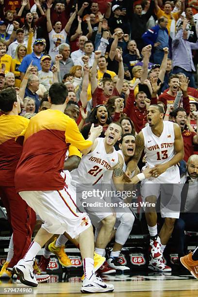 Iowa State bench erupts in celebration after Iowa State guard Monte Morris drains a last second basket during the Thursday game between Iowa State...