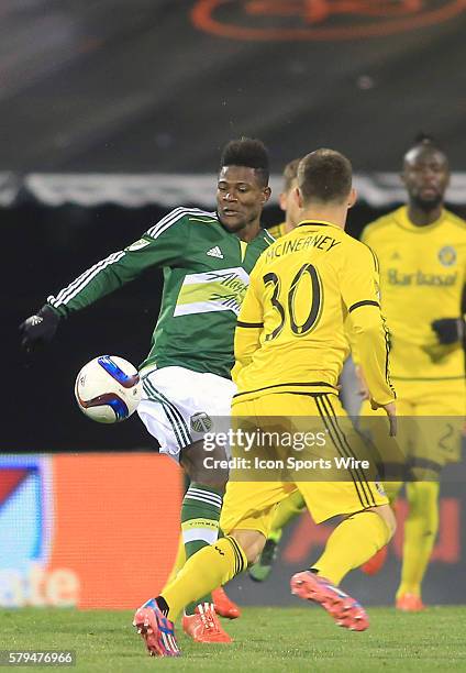Columbus Crew forward Jack McInerney watches a move by Portland Timbers midfielder/forward Dairon Asprilla during the MLS Cup final at Mapfre Stadium...