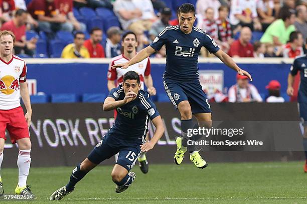 Vancouver FC forward/midfielder Nicolas Mezquida and Vancouver FC midfielder Matias Laba during the second half of the game between the New York Red...