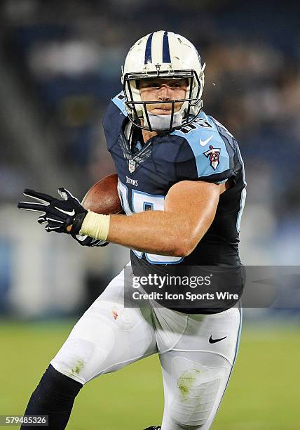 Tennessee Titans tight end Chase Coffman runs the ball after a catch during a game between the Tennessee Titans and Minnesota Vikings at Nissan...