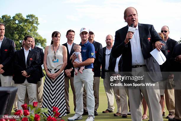 Chris Berman of ESPM introduces winner Kevin Streelman, his with Courtney and daughter Sophie during the trophy presentation for the Travelers...