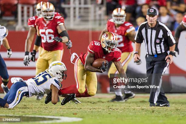 San Francisco 49ers wide receiver DeAndrew White is tackled by San Diego Chargers cornerback Richard Crawford during an NFL football game between the...