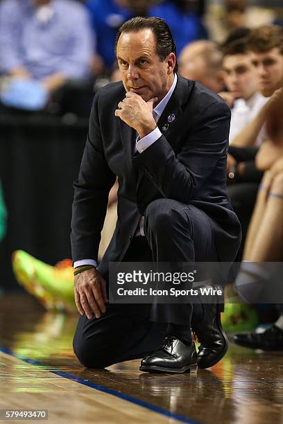 Pensive Notre Dame Fighting Irish head coach Mike Brey during the ACC Tournament at Greensboro Coliseum in Greensboro, NC. Notre Dame advances to the...