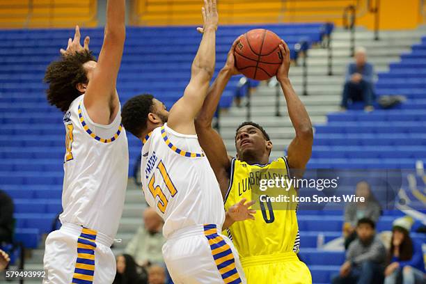 Northern Arizona Lumberjacks guard Torry Johnson drives to the basket with Cal State Bakersfield Roadrunners guard Justin Pride defending during the...