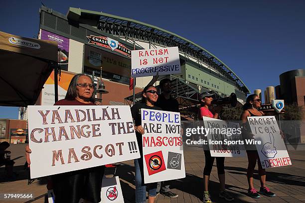 Native Americans, Lita and Kristy Blackhorse, Marcus , Amanda Blackhorse and Tawnya Brown protest the use of the Chief Wahoo mascot by the Cleveland...