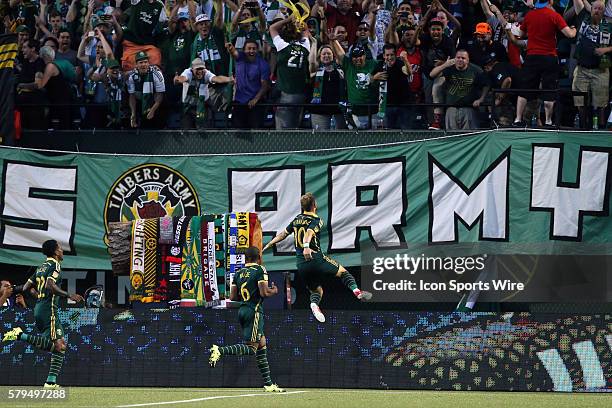 Portland's Gaston Fernandez celebrates his goal with Darlington Nagbe and Rodney Wallace in front of the Timbers Army. The Portland Timbers FC hosted...