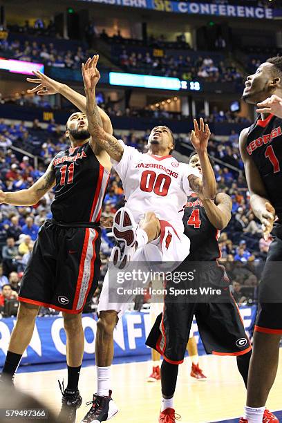 March 14, 2015 Arkansas Razorbacks guard Rashad Madden drives to the basket during the 2015 SEC Men's Basketball Tournament semi-final game 2 between...