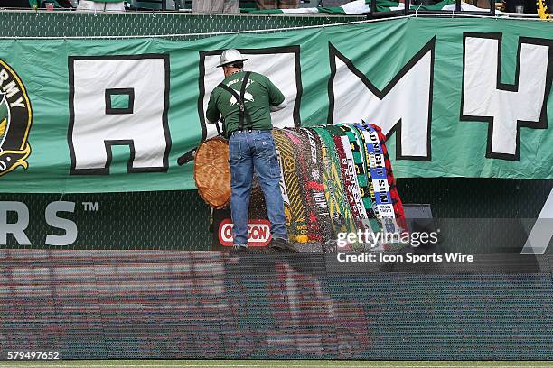 Joey Webber, the Portland Timbers' mascot Timber Joey, uses his chainsaw to cut into a log in front of the Timbers Army. The Portland Timbers FC...