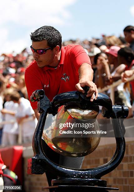 Member of the Texas Tech Saddle Tramps rings the Banging Bertha bell after a Texas Tech touchdown. Texas Tech played Sam Houston State Saturday...