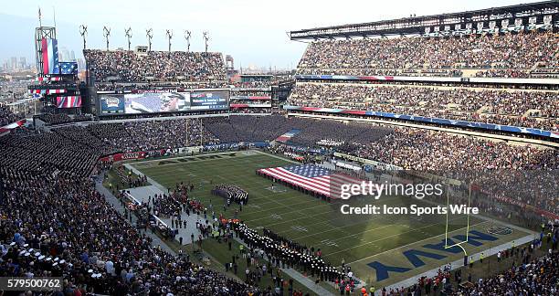 An American Flag is displayed on the field before a match between Army and Navy at Lincoln Financial Field in Philadelphia, Pennsylvania.