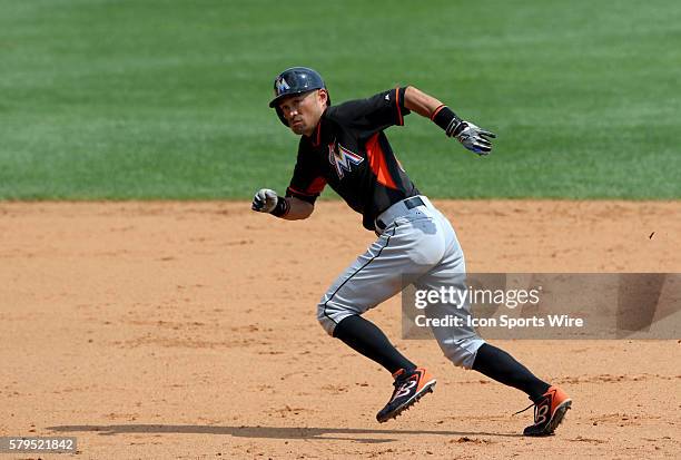 Lake Buena Vista, FL, USA; Miami Marlins right fielder Ichiro Suzuki sprints to third base during a spring training game against the Atlanta Braves...