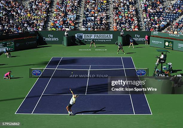 Rafael Nadal serving on center court during a quarterfinals match against Milos Raonic during the BNP Paribas Open Tennis Tournament played at the...