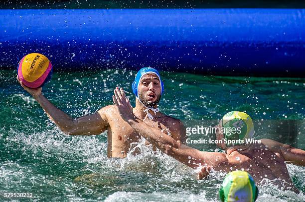 Stefano Luongo of Italy looks to get the ball past Johnno Cotterill during Australia's 14-10 loss to Italy in the Mens AUS v ITA International Water...