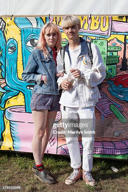 Festival goers pose in a denim jacket and all white outfit during Splendour in the Grass 2016 on July 22, 2016 in Byron Bay, Australia.