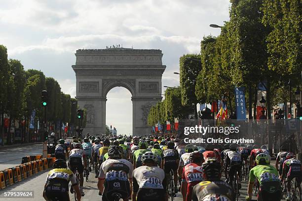 The pelaton aproaches the Arc de Triomph on the first lap during stage twenty one of the 2016 Le Tour de France, from Chantilly to Paris...