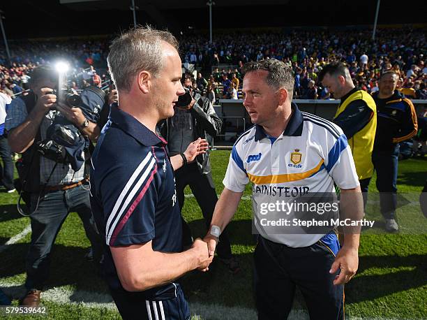 Tipperary , Ireland - 24 July 2016; Clare manager Davy Fitzgerald and Galway managet Míchéal Donoghue shake hands following the GAA Hurling...