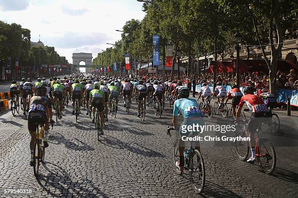 The pelaton aproaches the Arc de Triomph on the first lap during stage twenty one of the 2016 Le Tour de France, from Chantilly to Paris...