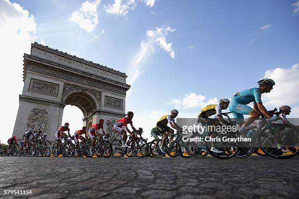 The pelaton pass The Arc de Triomphe during stage twenty one of the 2016 Le Tour de France, from Chantilly to Paris Champs-Elysees on July 24, 2016...