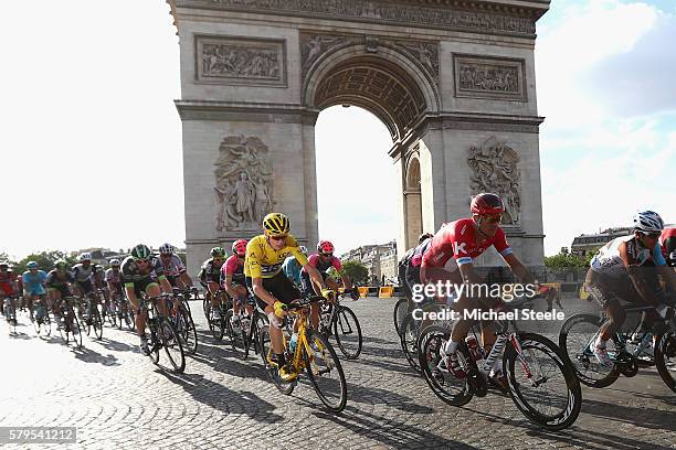 Chris Froome of Great Britain and Team Sky and the rest of the peloton cycle past The Arc de Triomphe during stage twenty one of the 2016 Le Tour de...