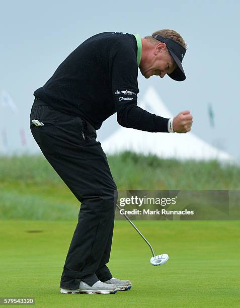 Paul Broadhurst of England celebrates after holing his final putt on 18 to win The Senior Open Championship at Carnoustie Golf Club on July 24, 2016...