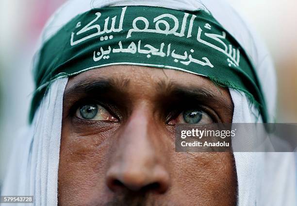 Protestors is seen during a protest, held against killing of Burhan Muzaffar Wani, leader of Hizbul Mujahideen in Kashmir by Jamaat-e-Islami, in...