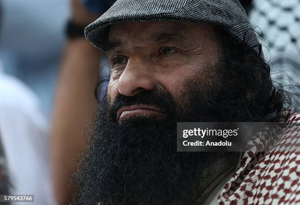 Leader of Hizbul Mujahideen Seyid Selahaddin is seen during a protest, held against killing of Burhan Muzaffar Wani, leader of Hizbul Mujahideen in...