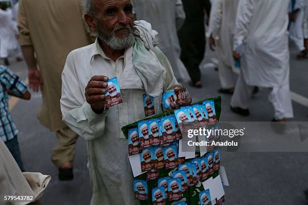 Protestors is seen during a protest, held against killing of Burhan Muzaffar Wani, leader of Hizbul Mujahideen in Kashmir by Jamaat-e-Islami, in...