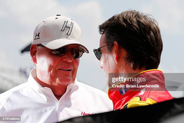 Team owner Rick Hendrick and Jeff Gordon, driver of the Axalta Chevrolet, stands on the grid prior to the NASCAR Sprint Cup Series Crown Royal...