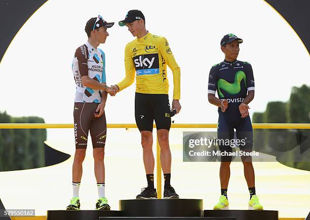 Chris Froome of Great Britain and Team Sky celebrates finishing first, Romain Bardet of France and AG2R La Mondial Team celebrates finising second...