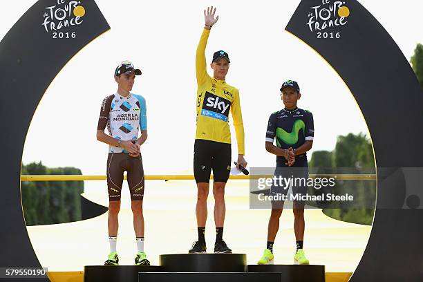 Chris Froome of Great Britain and Team Sky celebrates finishing first, Romain Bardet of France and AG2R La Mondial Team celebrates finising second...