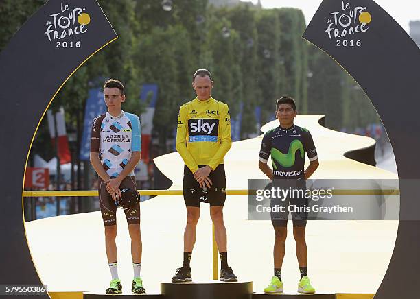 Chris Froome of Great Britain and Team Sky celebrates finishing first, Romain Bardet of France and AG2R La Mondial Team celebrates finising second...