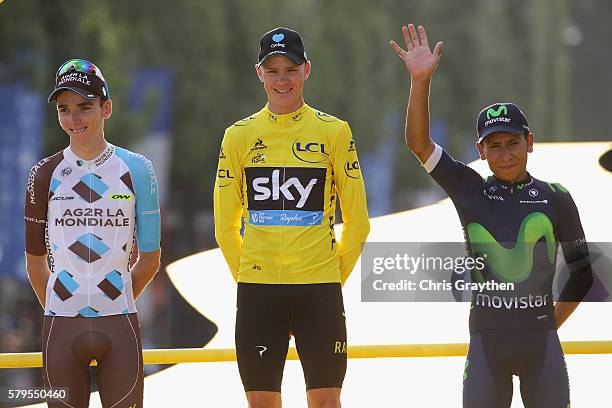 Chris Froome of Great Britain and Team Sky celebrates finishing first, Romain Bardet of France and AG2R La Mondial Team celebrates finising second...