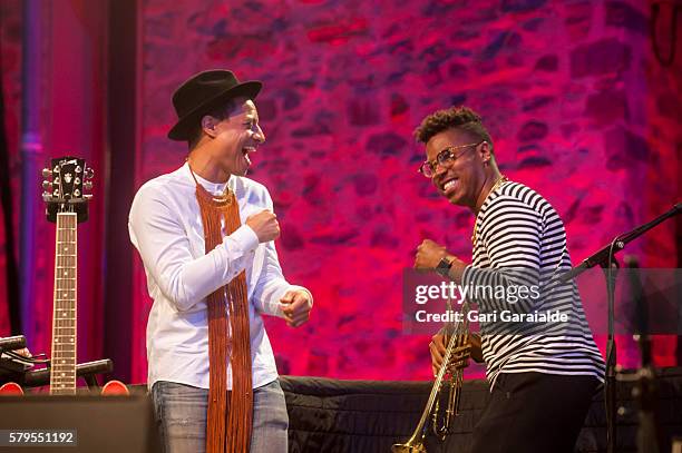 American jazz singer Jose James performs onstage with trumpet player Christian Scott during 51st edition of Heineken Jazzaldia Festival on July 24,...