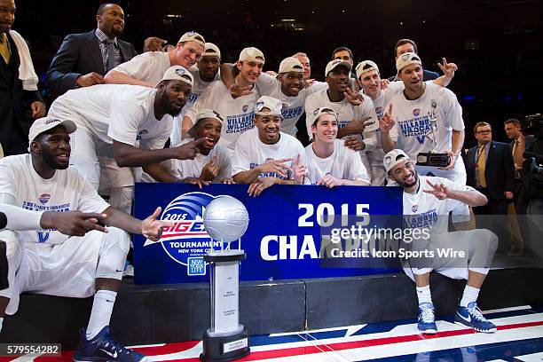 Big East Champions Villanova Wildcats defeating the Xavier Musketeers. Presenting trophy to crowd. During the Xavier Musketeers game versus the...