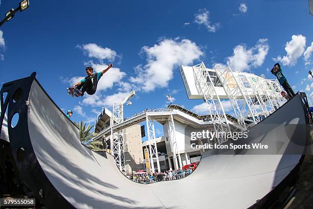 Skateboarder performs a trick on a halfpipe provided by InstaRamp during a pre-game tailgate party just outside the stadium prior to the NFL game...