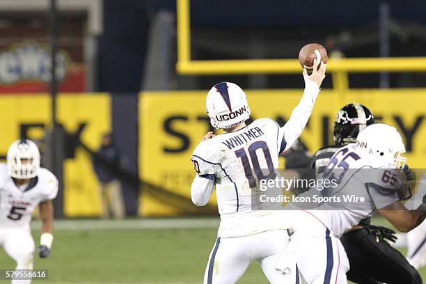 Uconn Huskies Quarterback Chandler Whitmer throws from the pocket during a NCAA football game between the UConn Huskies and the Army Black Knights at...