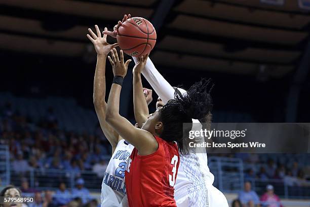 North Carolina's Stephanie Mavunga blocks a shot by Ohio State's Kelsey Mitchell . The University of North Carolina Tar Heels hosted the Ohio State...