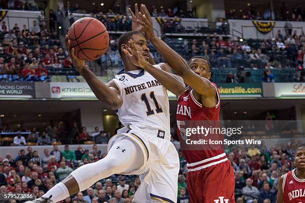 Notre Dame Fighting Irish guard Demetrius Jackson drives by Indiana Hoosiers forward Troy Williams during the Crossroads Classic NCAA basketball game...