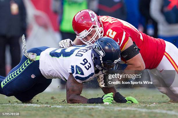 Kansas City Chiefs tackle Eric Fisher blocks Seattle Seahawks defensive end O'Brien Schofield during the NFL game between the Seattle Seahawks and...