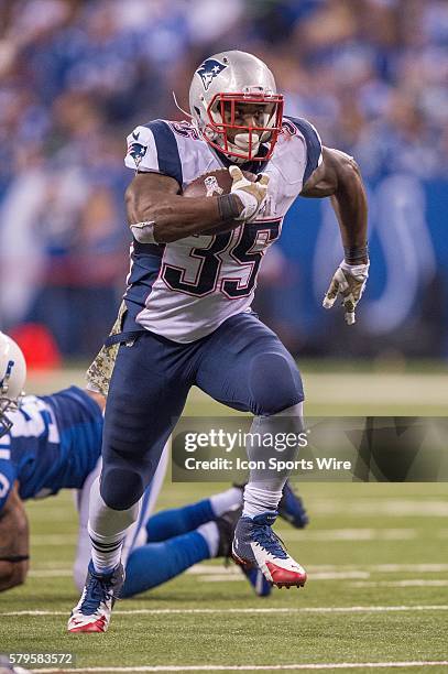 New England Patriots running back Jonas Gray runs up the middle during a football game between the Indianapolis Colts and New England Patriots at...