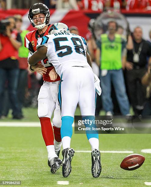 Carolina Panthers outside linebacker Thomas Davis sacks Atlanta Falcons quarterback Matt Ryan and fumbles the ball during the second quarter of the...