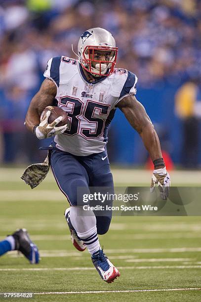 New England Patriots running back Jonas Gray breaks free for a big gain during a football game between the Indianapolis Colts and New England...